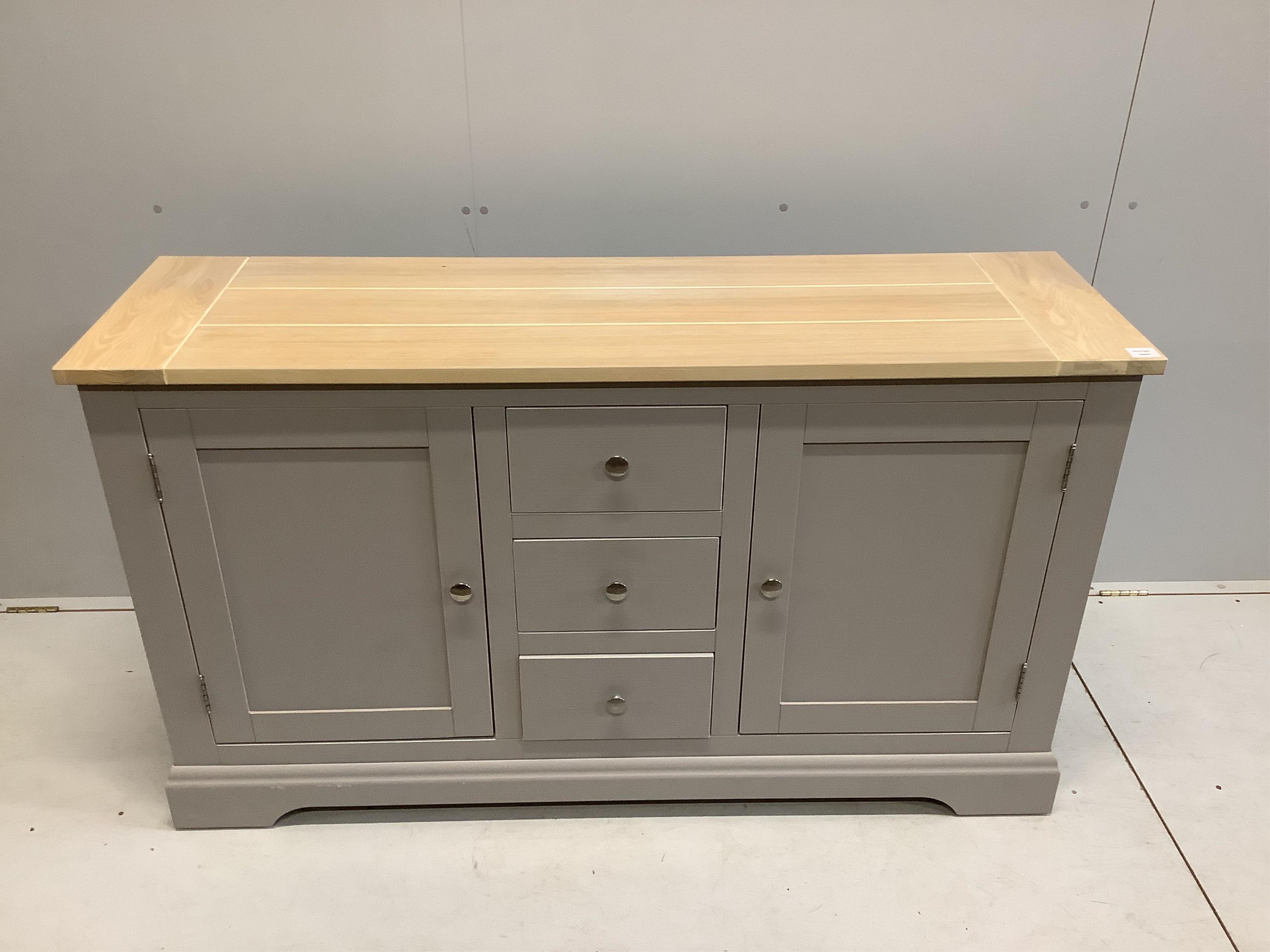 A Laura Ashley 'Dorset Furniture' painted sideboard, width 153cm, depth 45cm, height 89cm. Condition - good